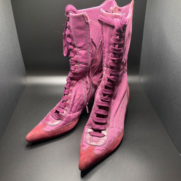 Pink lace up boots.
