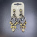 Gold and silver ear rings.