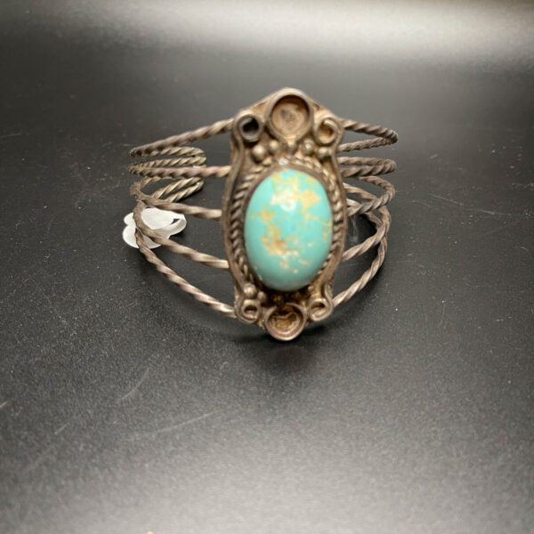 Big turquoise ring.