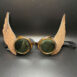 Goggle with wings.
