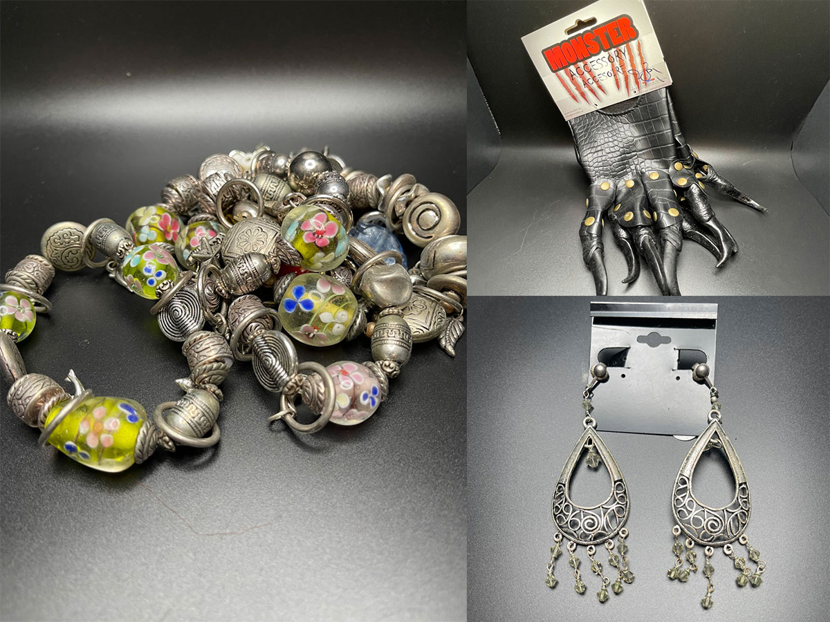 Bracelets, monster hand, and earrings showing different accessories.