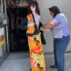 Cari Nuss dressing up a lady mannequin.